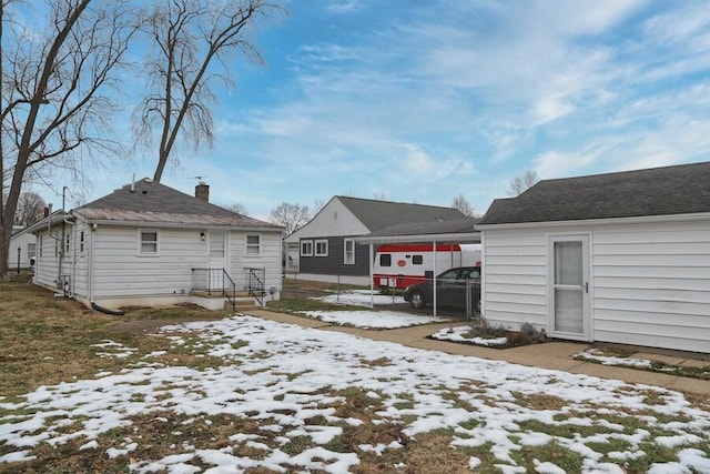 view of snow covered property