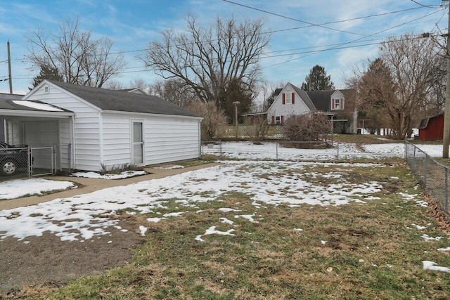 view of yard layered in snow