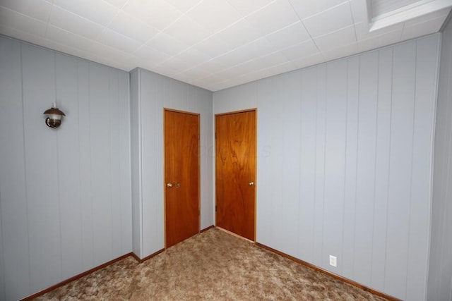 unfurnished room with carpet flooring