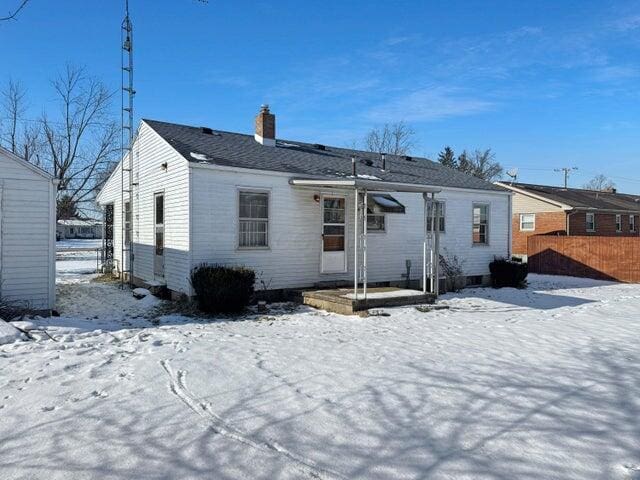 view of snow covered property