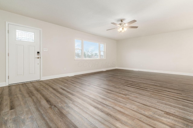 entrance foyer featuring ceiling fan and hardwood / wood-style floors