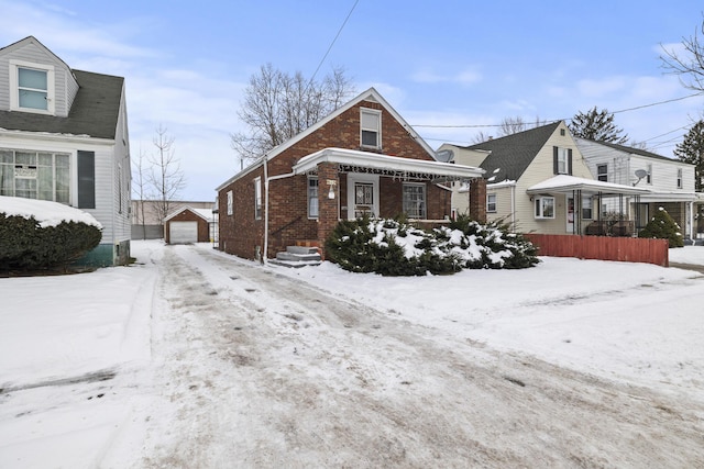 view of front facade featuring a garage and covered porch