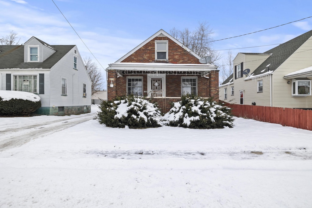 bungalow-style home with a porch