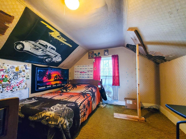 carpeted bedroom featuring vaulted ceiling and a textured ceiling