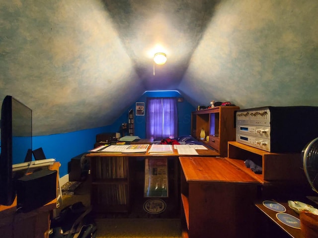 home office featuring vaulted ceiling