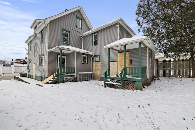 view of snow covered property