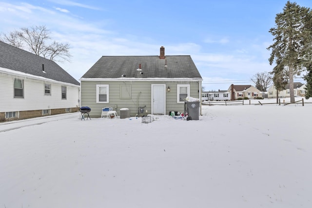 view of snow covered property