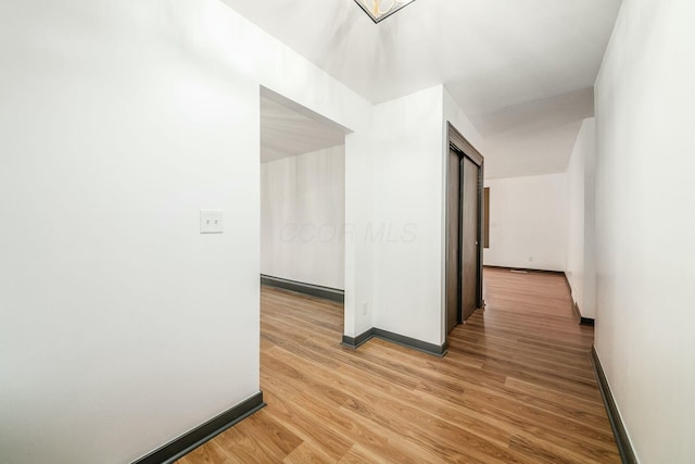 corridor featuring light wood-type flooring