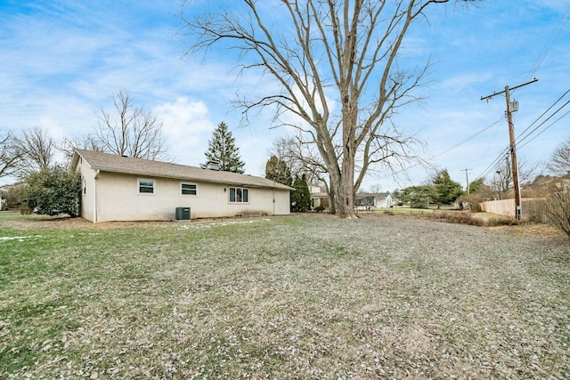 view of yard featuring central AC unit