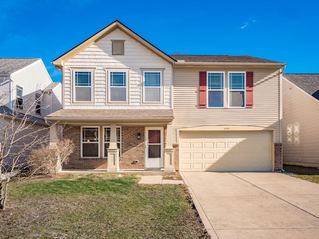 view of front of home with a garage, covered porch, and a front lawn