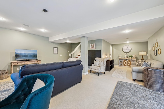 living room featuring light carpet