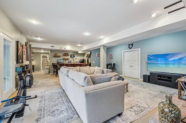 living room featuring light colored carpet