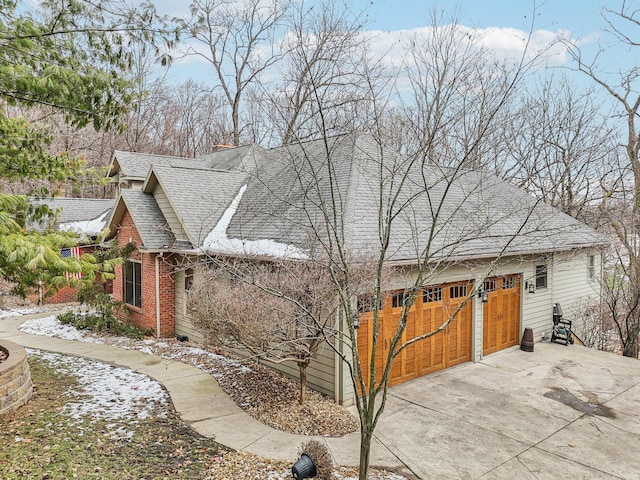 view of side of property featuring a garage