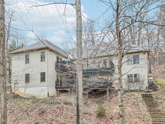 view of property exterior with a balcony