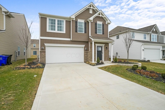 view of front facade with a garage and a front lawn