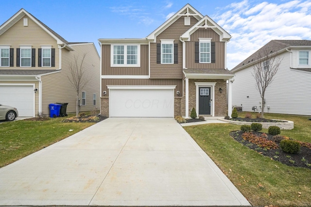 view of front facade with a garage and a front yard