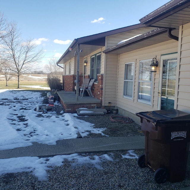 view of snow covered property