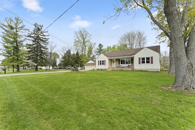 view of front of home with a porch and a front lawn