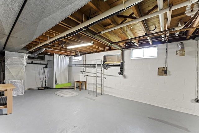 below grade area featuring a sink