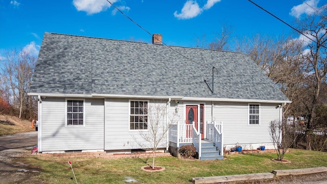 view of front of home featuring a front lawn