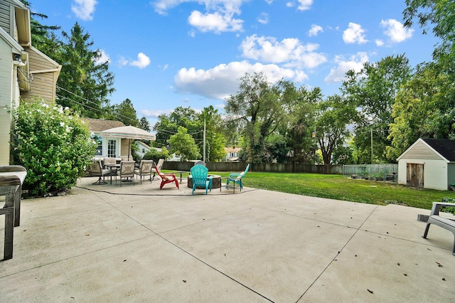 view of patio featuring a storage shed