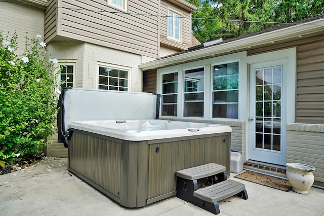 view of patio featuring a hot tub