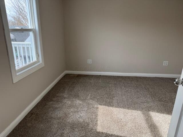 empty room with carpet floors