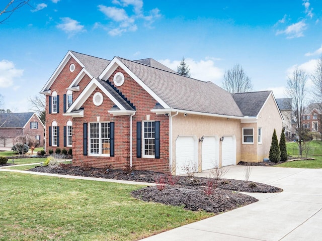 view of front of property with driveway, an attached garage, a front lawn, and brick siding