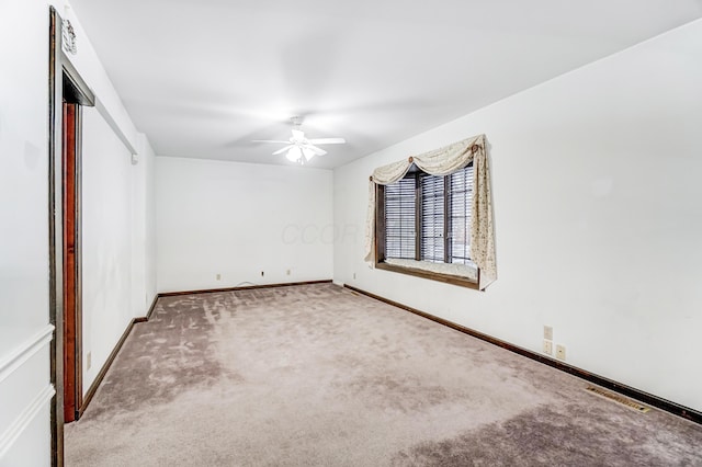 unfurnished bedroom with ceiling fan and carpet flooring