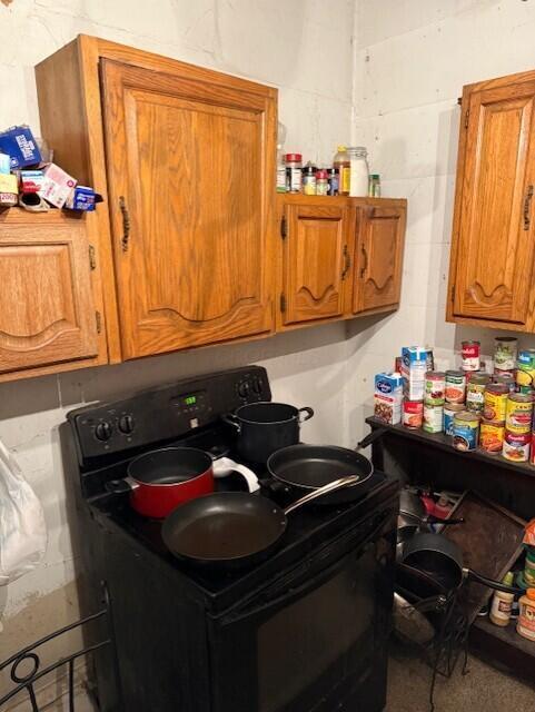 kitchen featuring black electric range