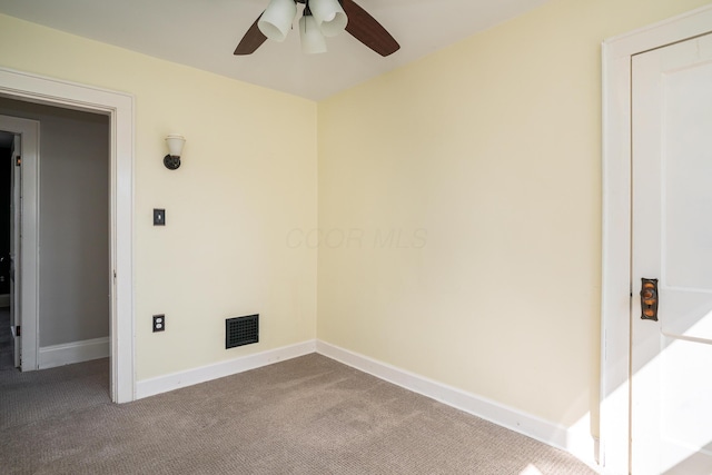 carpeted empty room with ceiling fan