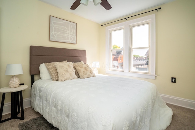 bedroom with ceiling fan and carpet