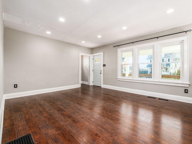 interior space with dark hardwood / wood-style flooring