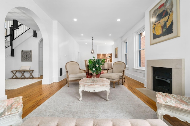 living room with light hardwood / wood-style flooring