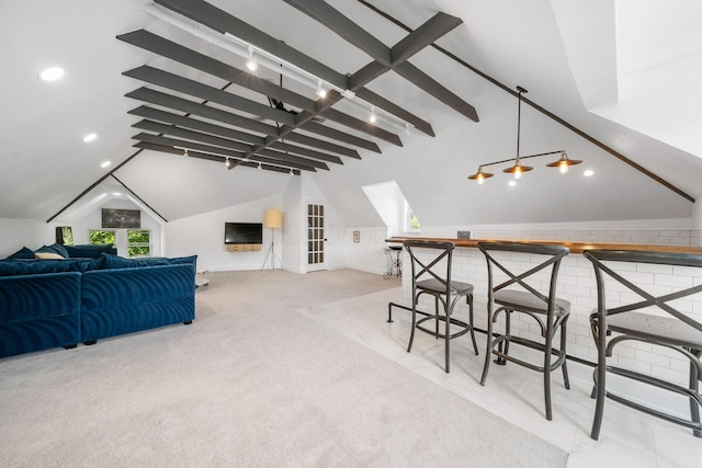 interior space with lofted ceiling with beams