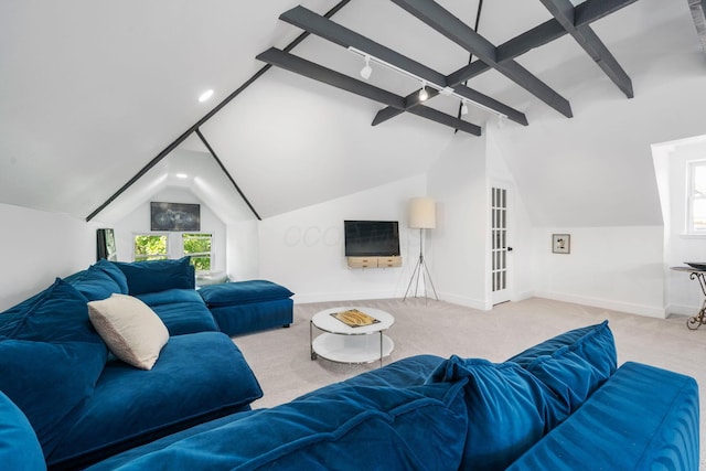 living room featuring vaulted ceiling with beams, french doors, and carpet