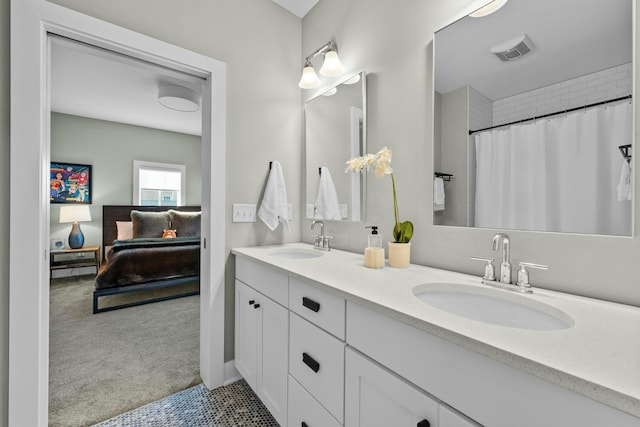 bathroom featuring vanity and a shower with curtain