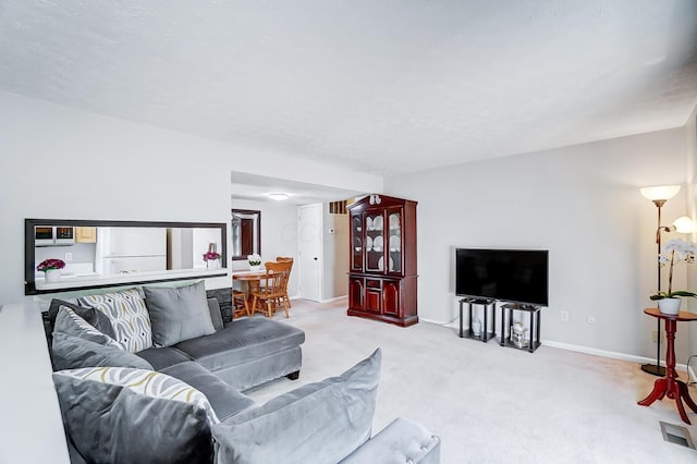 living room with light colored carpet