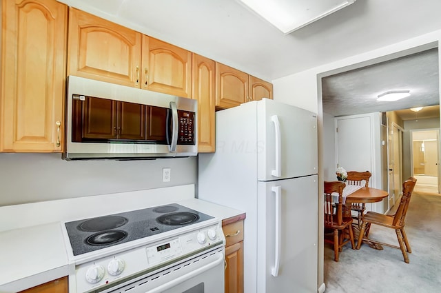 kitchen featuring white appliances