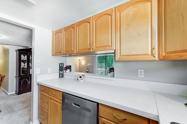 kitchen with light carpet and stainless steel dishwasher