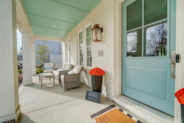 doorway to property with covered porch