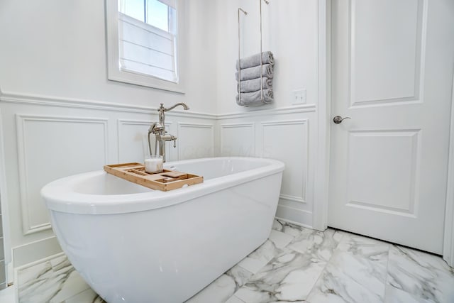 bathroom featuring a washtub