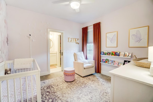 bedroom featuring ensuite bathroom and ceiling fan