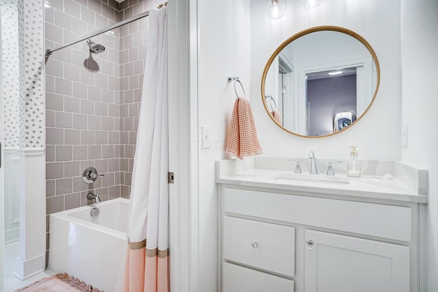 bathroom with shower / bathtub combination with curtain and vanity