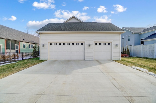 view of front of home with a garage and a front yard