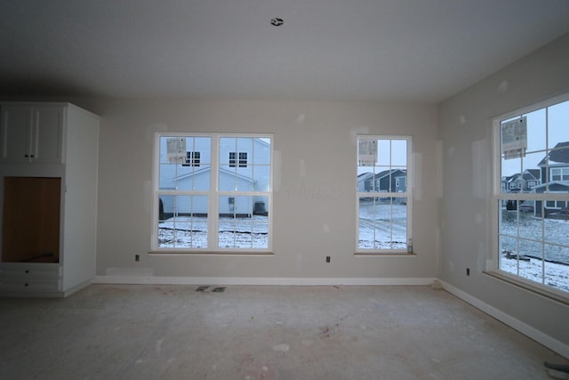 unfurnished dining area featuring a wealth of natural light