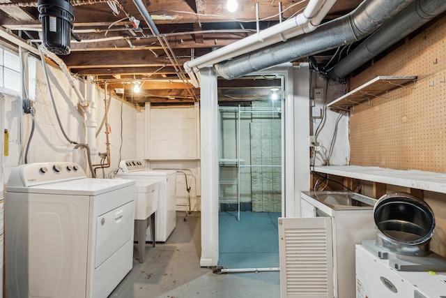 clothes washing area with independent washer and dryer