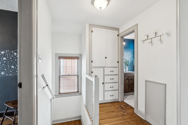 hallway with dark wood-type flooring