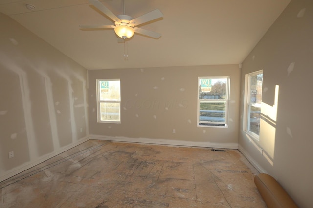 spare room with lofted ceiling and ceiling fan