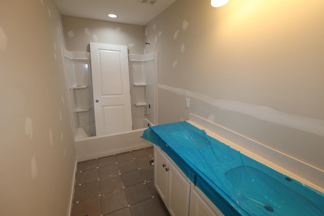 bathroom featuring shower / bath combination, visible vents, vanity, and tile patterned floors